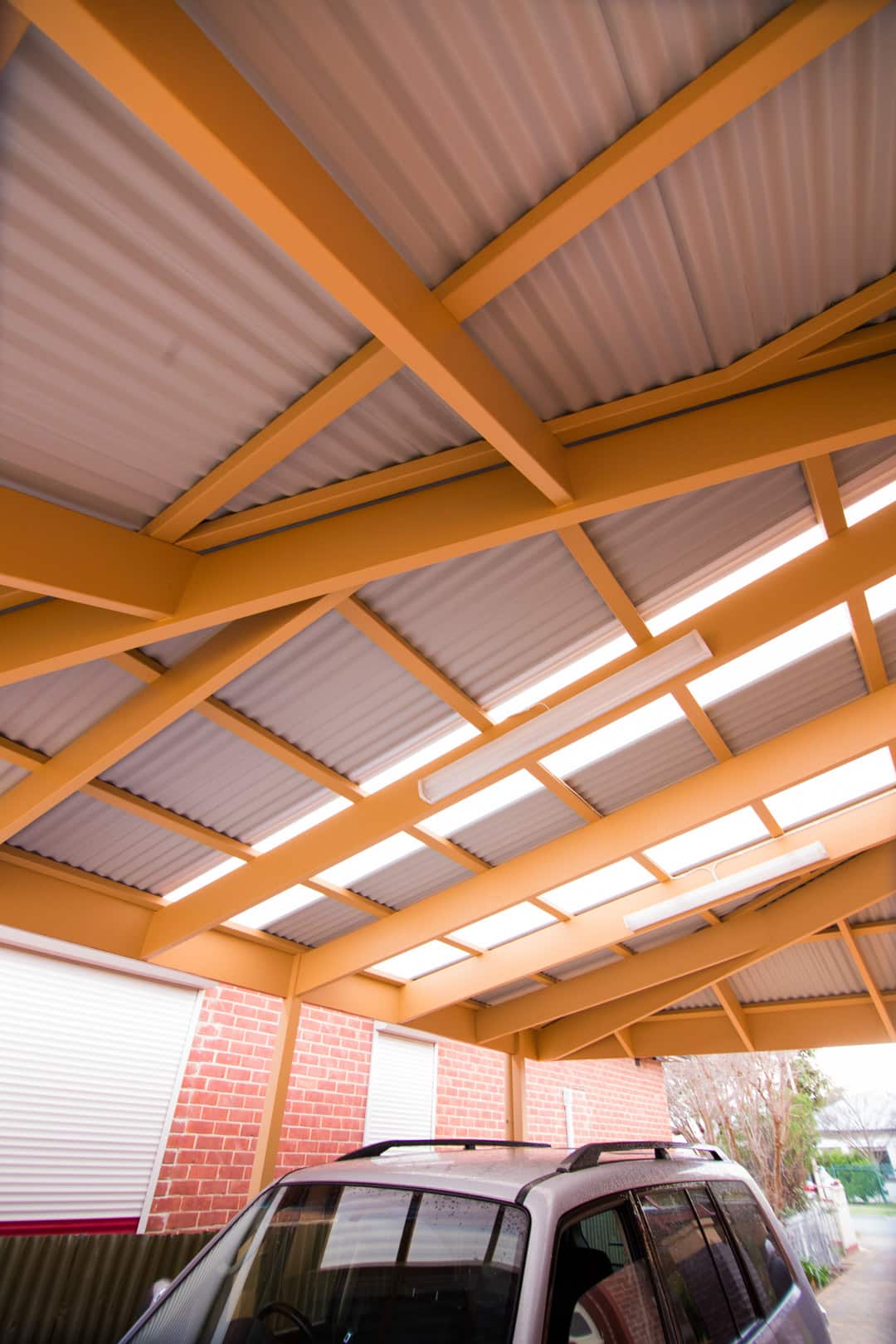 How can a carport help me this summer - Australian Outdoor Living can design a carport to fit in with the style of your home, Australian Outdoor Living