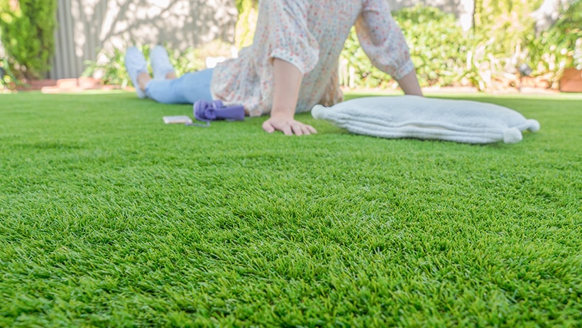 An artificial lawn will save you money