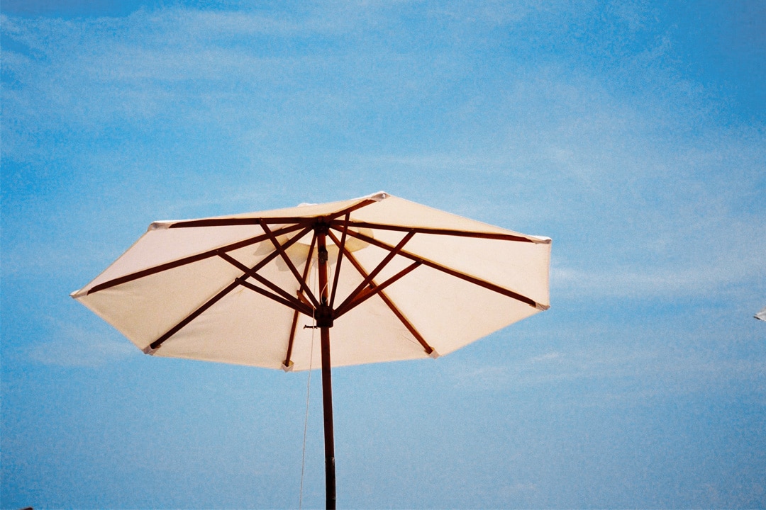 Put up a patio umbrella to add shade